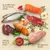 Jusqu’à 80 % viande, poisson et ingrédients animaux ; 20 % fruits, légumes et herbes ; 0 % céréales ajoutées. Texte en allemand.