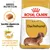 Royal Canin Adult Dachshund hondenvoer, specifiek afgestemde brokken, ondersteuning van de botten en gewrichten. Afbeelding van een teckel op de verpakking. Royal Canin Adult Dachshund hondenvoer, specifiek afgestemde brokken, ondersteuning van de botten en gewrichten. Afbeelding van een teckel op de verpakking.