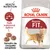 Royal Canin Regular Fit 32, perfil nutricional óptimo, tamaño de croqueta adaptado. Imagen de croquetas y un gato en el envase. Royal Canin Regular Fit 32, perfil nutricional óptimo, tamaño de croqueta adaptado. Imagen de croquetas y un gato en el envase.
