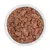 Close-up of wet food in a white bowl, consisting of meaty pieces and whole offal.