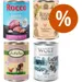 Quattro lattine di cibo umido per cuccioli: Rocco Junior, Rosie's Farm Puppy, Lukullus Junior, Wolf of Wilderness Junior Blue River. Simbolo percentuale arancione indica offerta o sconto.