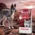 Συσκευασία Wolf of Wilderness Crimson Sunset, εμφανές κείμενο: Fresh pork meat with lamb & goat, 100% grain-free recipe. Φόντο με λύκο σε βραχώδες τοπίο.