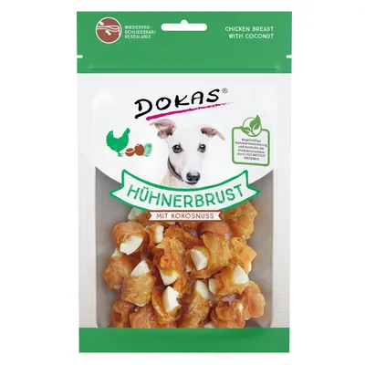 Опаковка Dokas Hühnerbrust mit Kokosnuss; пилешко филе с кокос за кучета. Видими парчета лакомства, надпис на немски и английски: Chicken Breast with Coconut. Резеалируемо.