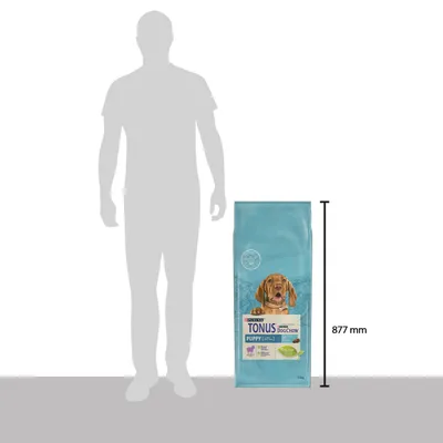 Confronto dimensioni: sacco Purina Tonus Dog Chow Puppy accanto a sagoma umana, altezza sacco 877 mm visibile sull'immagine.
