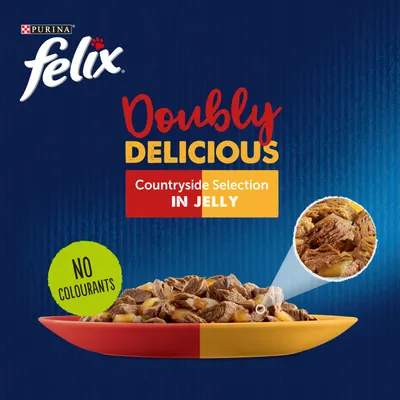 Purina Felix Doubly Delicious Countryside Selection in Jelly, no colourants. Image shows chunks of food in jelly on a red and yellow plate.