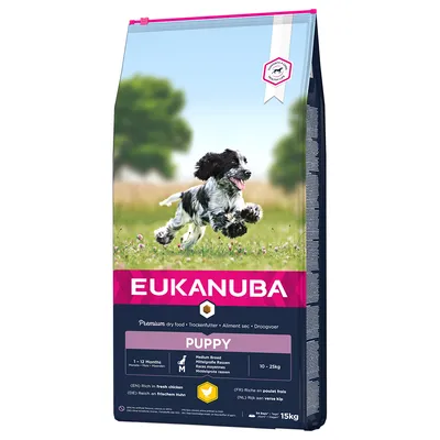 Eukanuba Premium hrană uscată pentru căței, rase medii, 1-12 luni, bogată în carne proaspătă de pui, pachet 15kg.