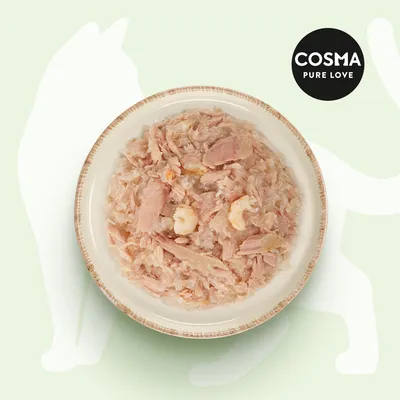Cosma Pure Love. Schüssel mit zarten Fleischstücken in natürlicher Konsistenz, vor grünem Hintergrund mit Katzenumriss.