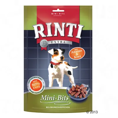 RINTI Extra Mini-Bits, mit 80% Ente, mit Ananas & Kiwi, vzduchem sušené, bez masové moučky. Na obalu pes a miska s pamlsky.