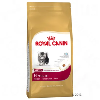 Saco de pienso Royal Canin Kitten Persian, texto visible: 'Up to 12 months old', imagen de un gatito persa y croqueta. Texto adicional: 'Feline Breed Nutrition'.
