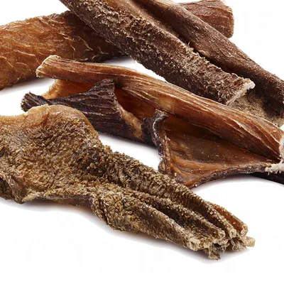 Dried beef tripe pieces, natural dog snacks without additives.