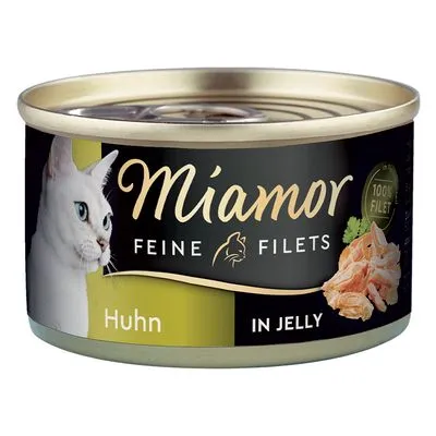 Miamor Feine Filets Huhn in Jelly kattenvoer, 100% filet zichtbaar op blik, afbeelding van witte kat en stukjes kipfilet op het etiket.