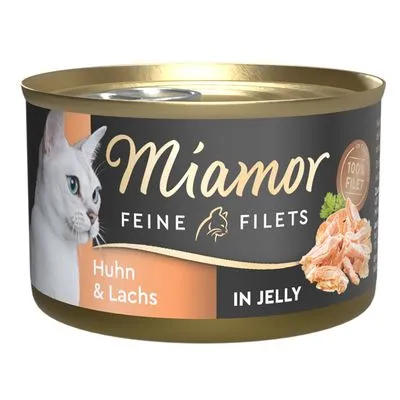 Miamor Feine Filets Huhn & Lachs in Jelly, afbeelding van een witte kat en stukjes filet, tekst: 100% Filet