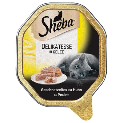 Sheba Delikatesse in Gelee, Geschnetzeltes mit Huhn au Poulet. Billede af kat og tallerken med kødstykker i gelé på emballagen.