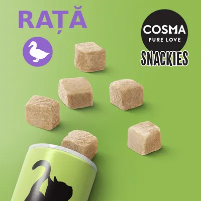 COSMA PURE LOVE SNACKIES, gust rață. Cuburi de snack-uri liofilizate pentru pisici, imagine cu recipient verde și siluetă de pisică.