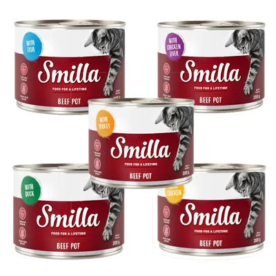 Cinco latas de Smilla Beef Pot 200 g, variantes visibles: with fish, with chicken liver, with turkey, with duck, with chicken. Etiqueta roja con imagen de gato y texto 'Food for a lifetime'.