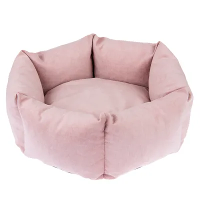 Panier pour animal de compagnie, forme ronde avec rebords hauts, tissu rose clair, coussin intégré visible.