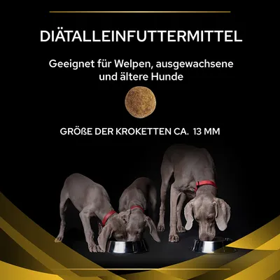 Diätalleinfuttermittel, geeignet für Welpen, ausgewachsene und ältere Hunde. Grösse der Kroketten ca. 13 mm. Drei Hunde fressen aus Futternäpfen.