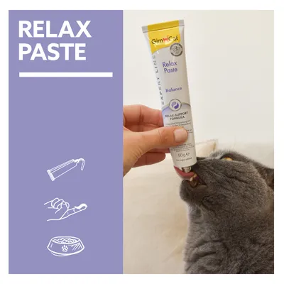 Simon's Cat Relax Paste Balance, Relax-Support-Formel. Tube mit 50g Inhalt, ohne Zuckerzusatz. Katze leckt Paste direkt aus der Tube.