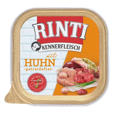 Rinti Kennerfleisch con pollo, sin cereales. Rinti desde 1983 Original. En la imagen: trozos de carne y ingredientes.