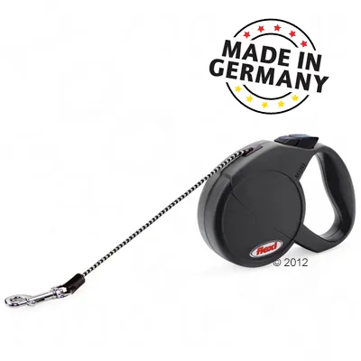 Автоматичен повод Flexi с черна пластмасова дръжка и метален карабинер. Видим надпис: MADE IN GERMANY.