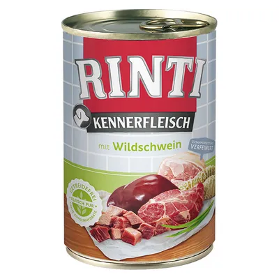 Konzerva Rinti Kennerfleisch mit Wildschwein, prikaz komada mesa i iznutrica na tanjuru, vidljiv tekst: getreidefrei, fleisch pur, ohne kohlenhydrate, zusammenstellung verfeinert.