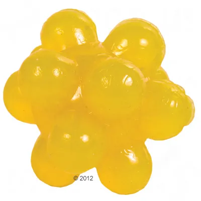 Gul boll med flera utbuktande knoppar, tillverkad i plast. Ingen synlig text eller varumärke.