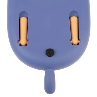 Blue plastic device with two orange inserts and a black round button. Detailed view of the underside.