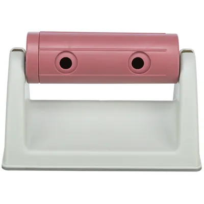 Rosa und weisser Tierhaarentferner mit zwei Löchern für einfache Reinigung von Textilien.