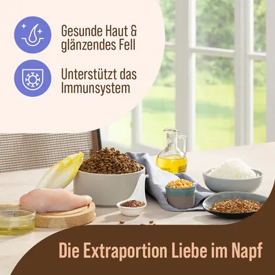 Gesunde Haut & glänzendes Fell. Unterstützt das Immunsystem. Die Extraportion Liebe im Napf mit Zutaten wie Huhn, Reis, Öl und Gemüse.