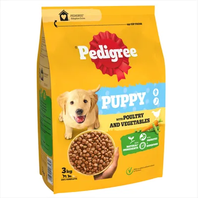 Bag labelled 'Puppy with poultry and vegetables', highlights natural ingredients, prebiotics, superfoods, no added artificial colours or flavours. Shows kibble and a puppy image. 3kg.
