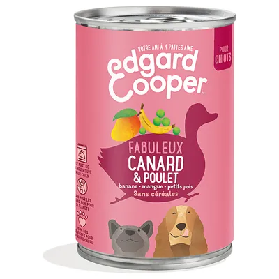 Blik Edgard Cooper Fabuleux Canard & Poulet, voor chiots. Tekst: banaan, mangue, petits pois, sans céréales. Illustraties van eend, hond, mango, banaan en erwten zichtbaar.