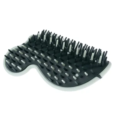 Black and white brush with flexible plastic bristles, ergonomic shape for coat care.