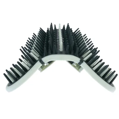 Corner brush with black and white bristles, suitable for cleaning corners or edges.