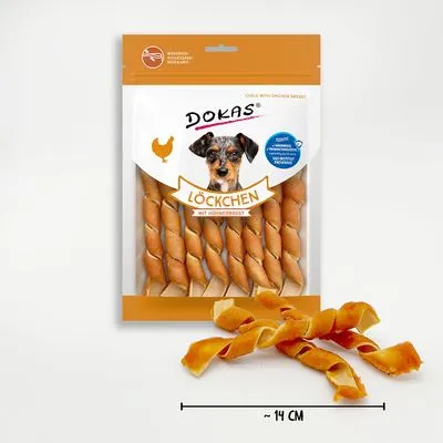 Zak Dokas Löckchen met kippenborst, zichtbare gedraaide snacks, lengte circa 14 cm. Tekst: geschikt voor voedingsgevoelige honden, zonder toegevoegde suiker.