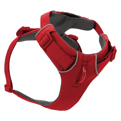 Red dog harness with adjustable straps, padded lining and reflective strips.