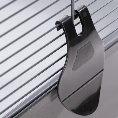 Black plastic clip for attaching to metal grids, suitable for cages or enclosures.