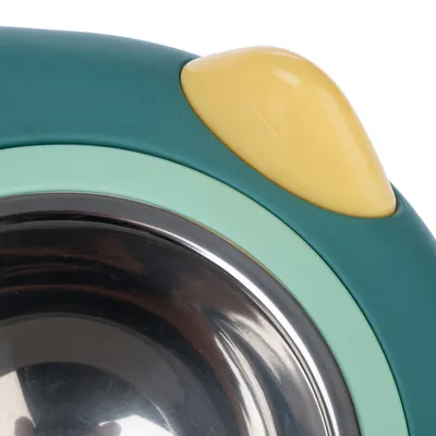 Stainless steel feeding bowl with green and yellow plastic rim, suitable for pets.