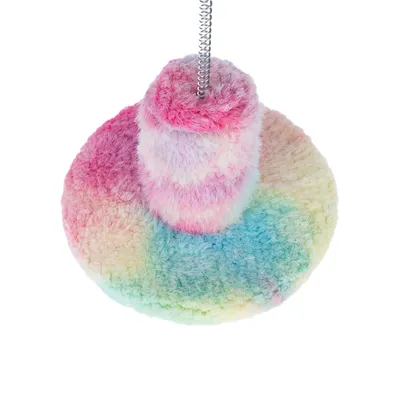 Spielzeug aus Plüsch in Regenbogenfarben mit einer Federhalterung oben.