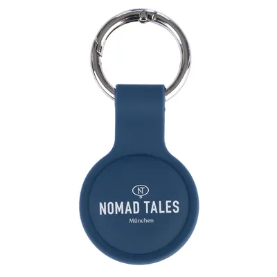 Porte-clés bleu avec anneau métallique, texte visible : NOMAD TALES München
