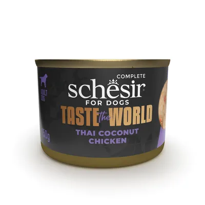 Boîte Schesir for Dogs Taste the World Thai Coconut Chicken 150 g, alimentation complète pour chien adulte. Texte en anglais sur l'emballage.