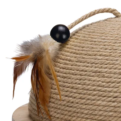 Toy made of sisal rope with feather and black ball, suitable for interactive play.