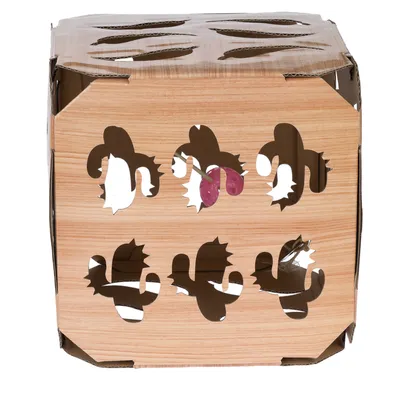 Cardboard cube with cut-out cat silhouettes and toy hanger in the shape of pink mice.
