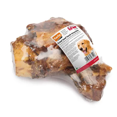 Karlie posušena goveja krača, brez glutena, teža 1 kg. Embalaža z vidnim opisom izdelka in črtno kodo.