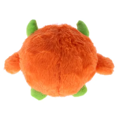 Pluche speelgoed in oranje met groene hoorns en poten, rond design.