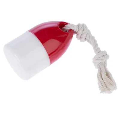 Jouet pour animal en forme de capsule, partie supérieure rouge et inférieure blanche en plastique, corde épaisse nouée à une extrémité.