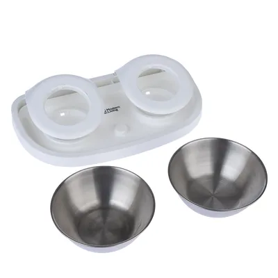 Modern Living feeding bowl set with white plastic holder and two removable stainless steel bowls.