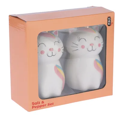 Set salière et poivrière en forme de chat, céramique blanche avec détails colorés, dans une boîte orange. Marque visible : Tiaki. Texte sur l’emballage : Salt & Pepper Set.