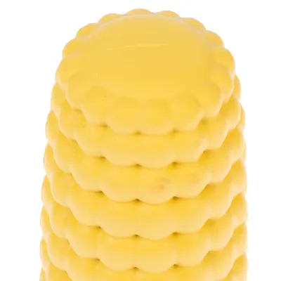 Giocattolo giallo a forma di pannocchia di mais con superficie strutturata, adatto per il gioco interattivo.