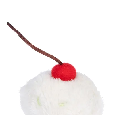 White plush toy with red felt ball and brown cord, suitable for interactive play.
