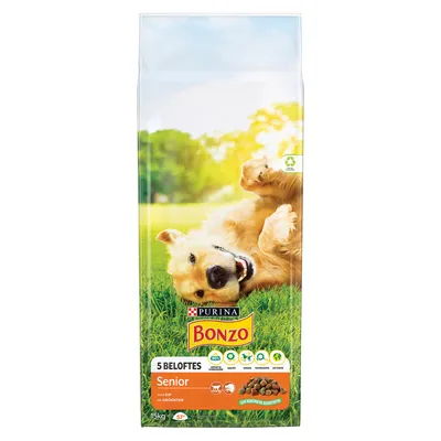 Confezione di crocchette Purina Bonzo Senior, 5 Beloftes, con pollo e verdure, 15 kg. Testo visibile in olandese. Immagine di un cane su prato sull’imballaggio.